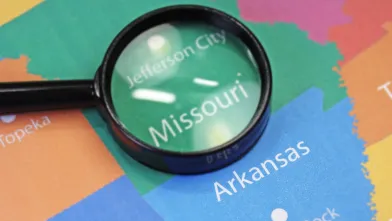 Magnifying glass over Missouri on a map