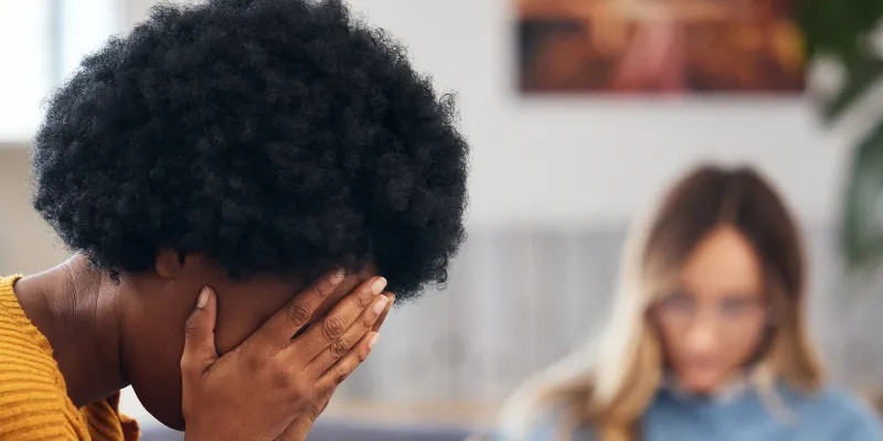 Woman talking with therapist