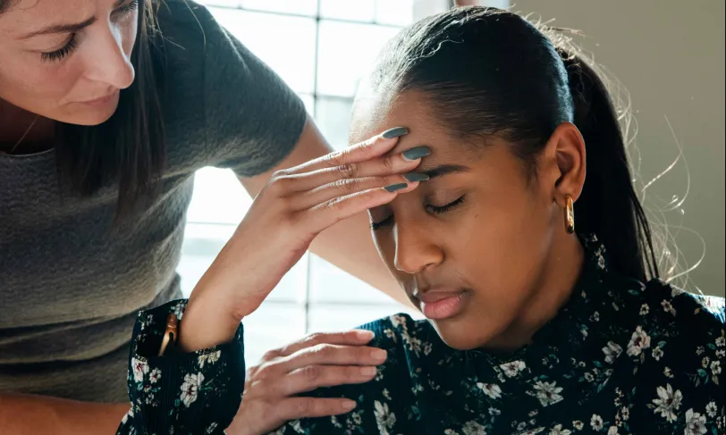 Concerned female patient meeting with doctor