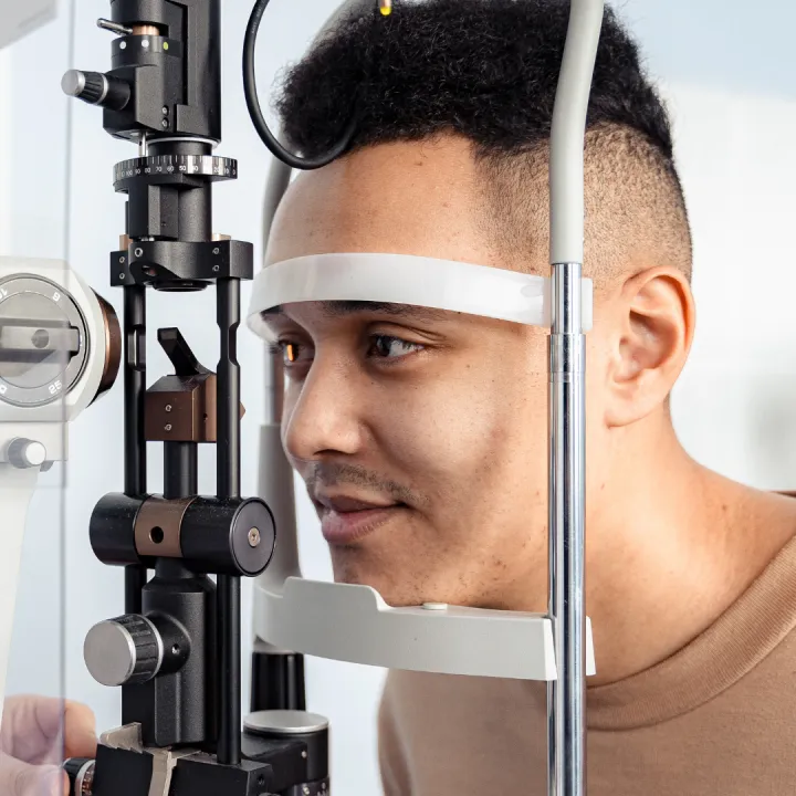 A man gets his eyes examined for diabetes eye disease